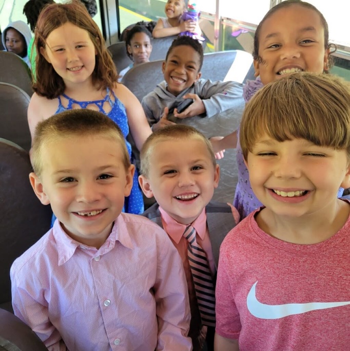 Children arriving on the FCC Sunday School bus